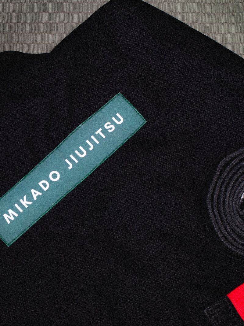 The Mikado Jiujitsu patch on a black gi